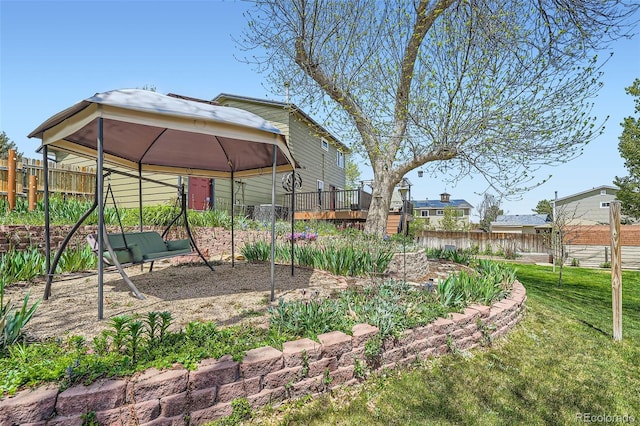 view of yard featuring a gazebo and a deck
