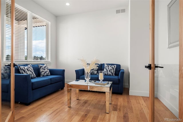 living room featuring light wood-type flooring