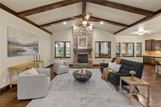 16104 Pole Pine Pt, Colorado Springs, CO 80908 - living room featuring wood finished floors, plenty of natural light, ceiling fan, a stone fireplace, and recessed lighting