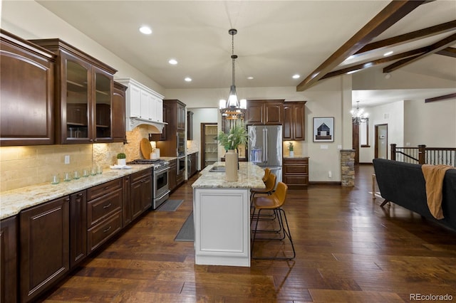 16104 Pole Pine Pt, Colorado Springs, CO 80908 - kitchen featuring stainless steel appliances, a chandelier, dark brown cabinets, glass insert cabinets, and recessed lighting