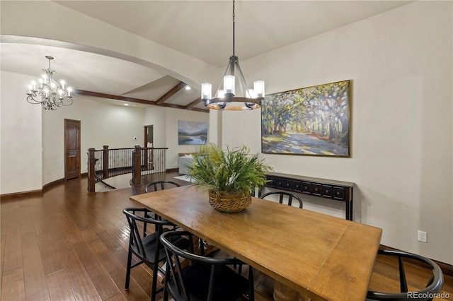 16104 Pole Pine Pt, Colorado Springs, CO 80908 - dining space featuring a chandelier, arched walkways, dark wood finished floors, recessed lighting, and beam ceiling