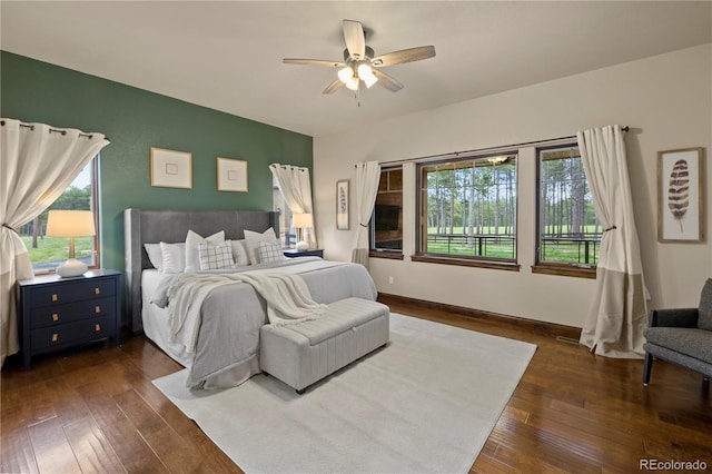 16104 Pole Pine Pt, Colorado Springs, CO 80908 - bedroom with dark wood-style flooring and ceiling fan