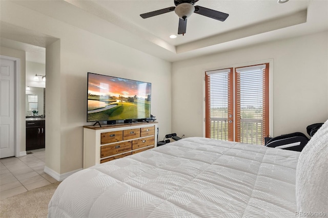 8464 E 55th Pl, Denver, CO 80238 - bedroom with light tile patterned floors, recessed lighting, access to outside, connected bathroom, and light colored carpet