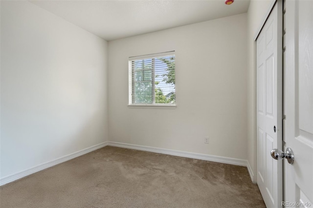 8464 E 55th Pl, Denver, CO 80238 - unfurnished bedroom with carpet, baseboards, and a closet