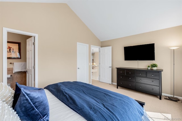 bedroom with light colored carpet, baseboards, and high vaulted ceiling