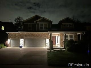 craftsman inspired home with a garage