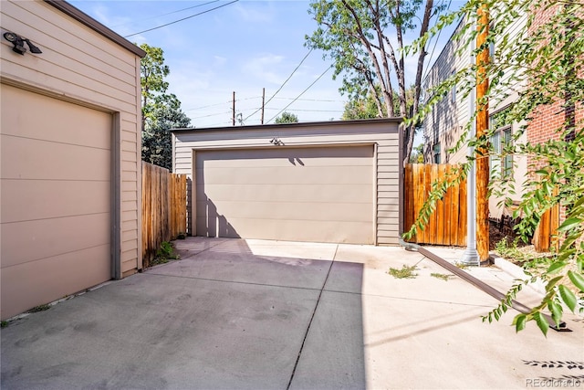 detached garage with fence