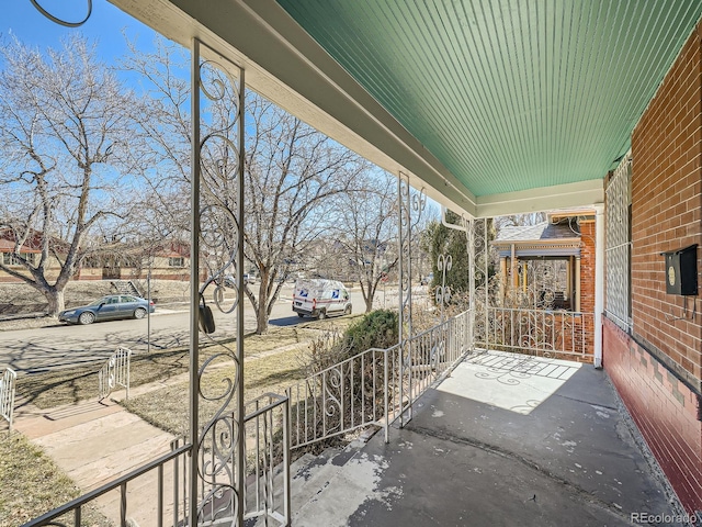 view of patio featuring a porch