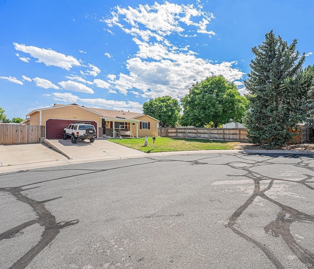 12244 Clermont Ct, Thornton, CO 80241 - view of front facade with an attached garage and concrete driveway