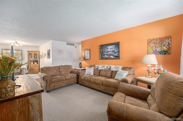 12244 Clermont Ct, Thornton, CO 80241 - carpeted living area featuring a textured ceiling