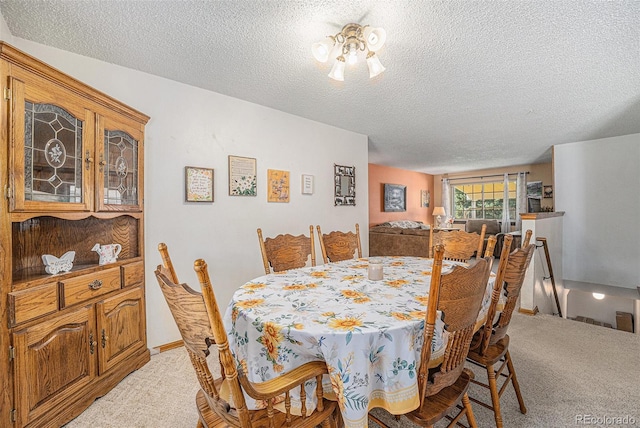 12244 Clermont Ct, Thornton, CO 80241 - dining area with light carpet and a textured ceiling