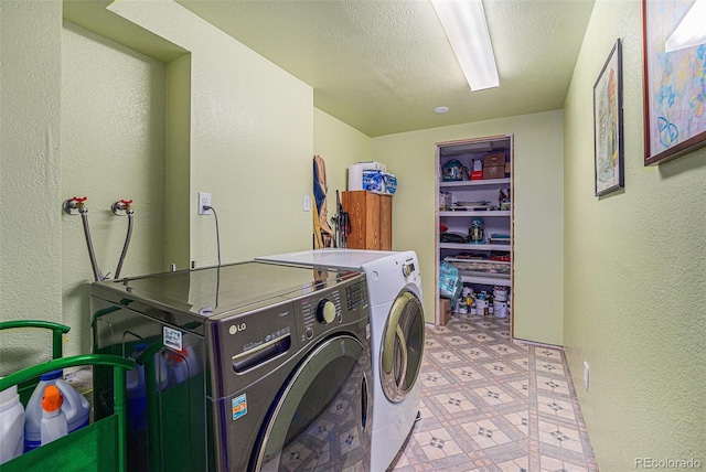12244 Clermont Ct, Thornton, CO 80241 - laundry room featuring washing machine and dryer, a textured wall, and tile patterned floors
