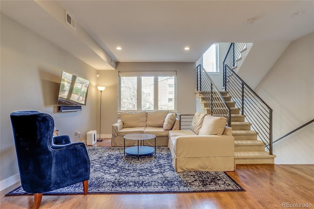 living room with hardwood / wood-style flooring