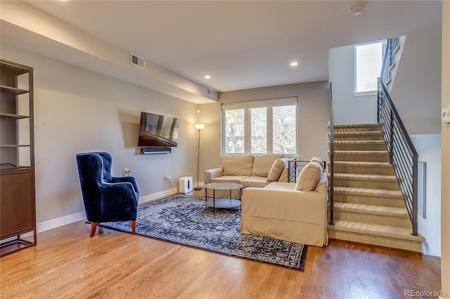 living room with wood-type flooring