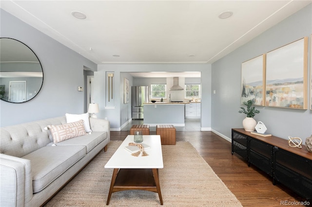8240 Grandview Ave, Arvada, CO 80002 - living room featuring wood finished floors and baseboards