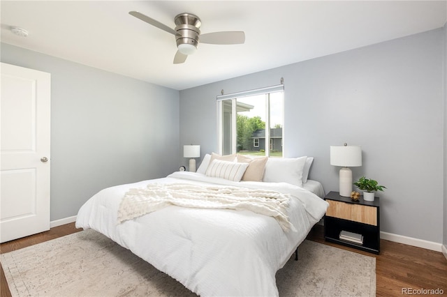 8240 Grandview Ave, Arvada, CO 80002 - bedroom featuring wood finished floors, baseboards, and ceiling fan