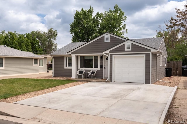 8240 Grandview Ave, Arvada, CO 80002 - ranch-style house with an attached garage, concrete driveway, and roof with shingles