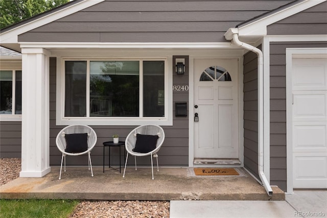 8240 Grandview Ave, Arvada, CO 80002 - view of exterior entry featuring covered porch
