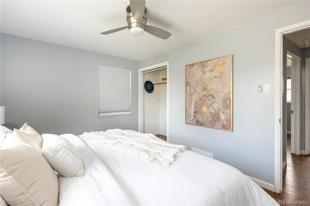 8240 Grandview Ave, Arvada, CO 80002 - bedroom featuring dark wood-style flooring, baseboards, a closet, and a ceiling fan