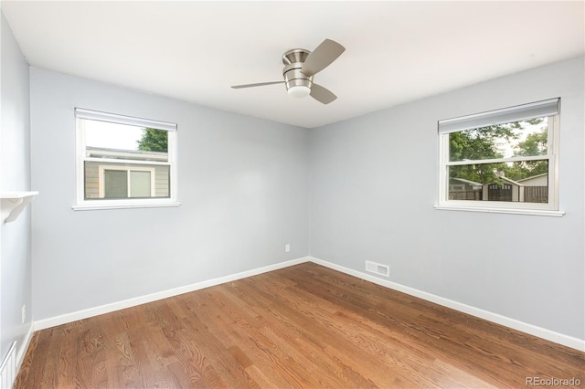 8240 Grandview Ave, Arvada, CO 80002 - unfurnished room featuring wood finished floors, baseboards, and ceiling fan