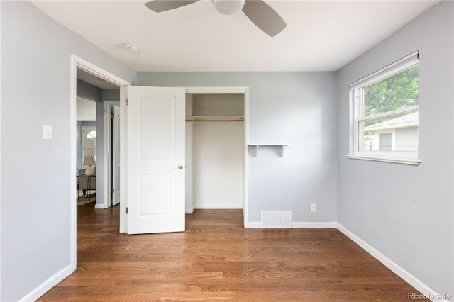 8240 Grandview Ave, Arvada, CO 80002 - unfurnished bedroom featuring a closet, wood finished floors, baseboards, and ceiling fan