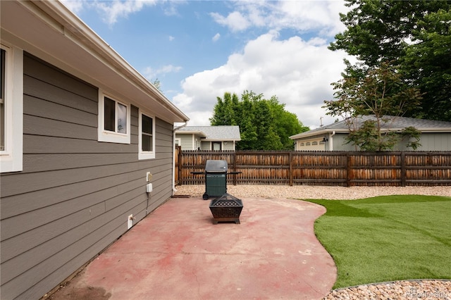 8240 Grandview Ave, Arvada, CO 80002 - view of patio / terrace featuring a grill and a fire pit