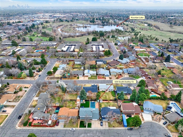 birds eye view of property with a residential view and a water view