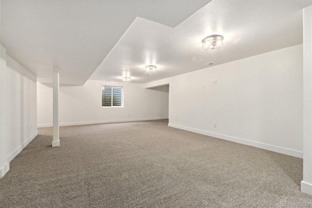 basement with carpet flooring