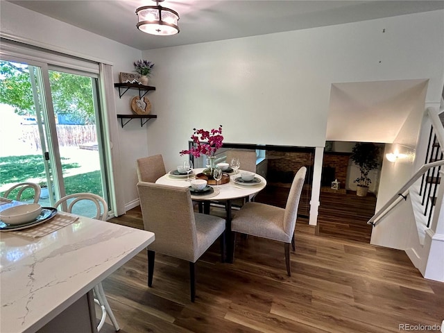 dining room featuring dark hardwood / wood-style flooring