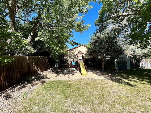 view of yard with a playground