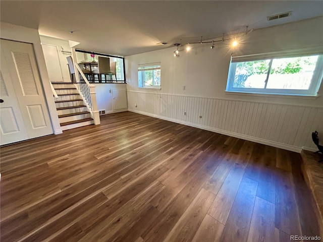 basement featuring dark wood-type flooring