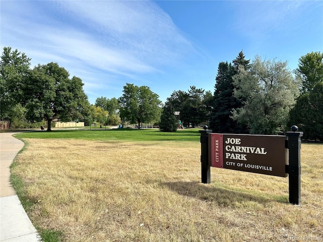 view of property's community with a yard