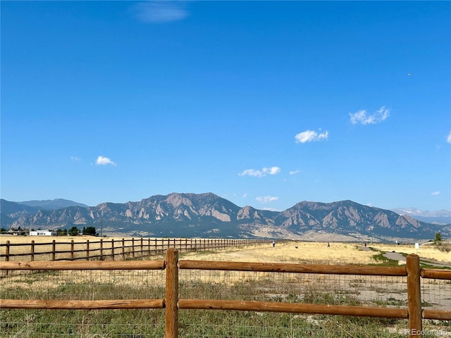 mountain view featuring a rural view