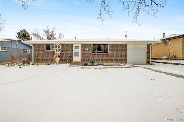 single story home featuring a garage