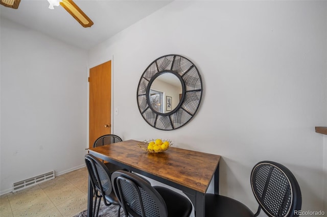 dining room with ceiling fan