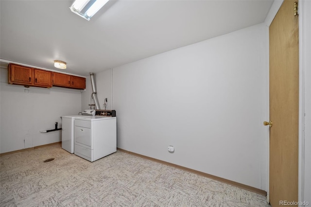 clothes washing area with independent washer and dryer