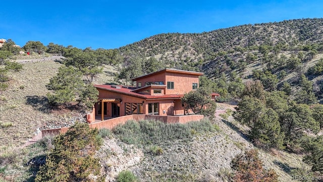 10405 W Cherokee Dr, Salida, CO 81201 - rear view of house with a mountain view