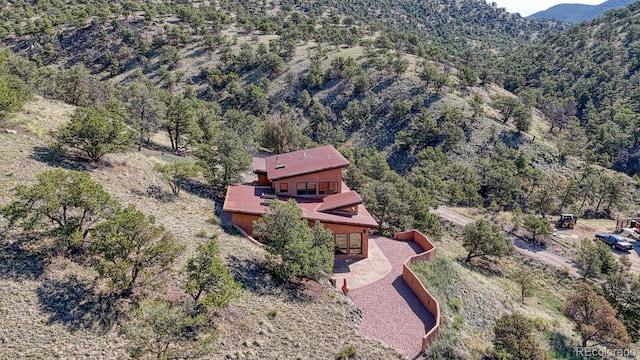 10405 W Cherokee Dr, Salida, CO 81201 - aerial view of property and surrounding area with a forest