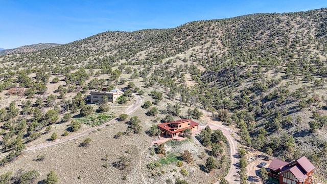 10405 W Cherokee Dr, Salida, CO 81201 - aerial view of property and surrounding area with a mountainous background