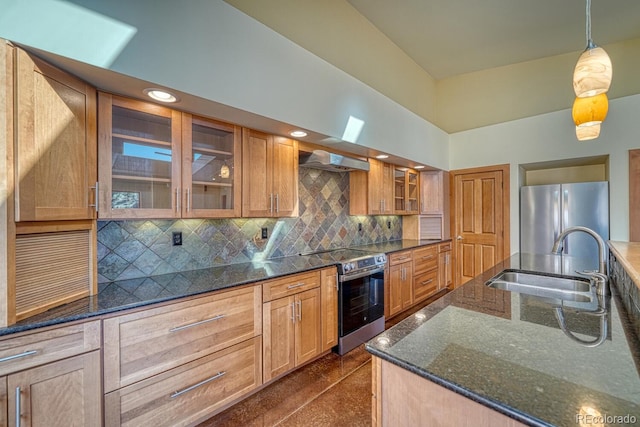 10405 W Cherokee Dr, Salida, CO 81201 - kitchen with appliances with stainless steel finishes, tasteful backsplash, dark stone counters, glass insert cabinets, and a towering ceiling