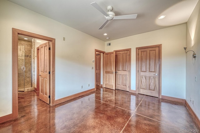 10405 W Cherokee Dr, Salida, CO 81201 - unfurnished bedroom featuring two closets, concrete floors, a ceiling fan, and recessed lighting