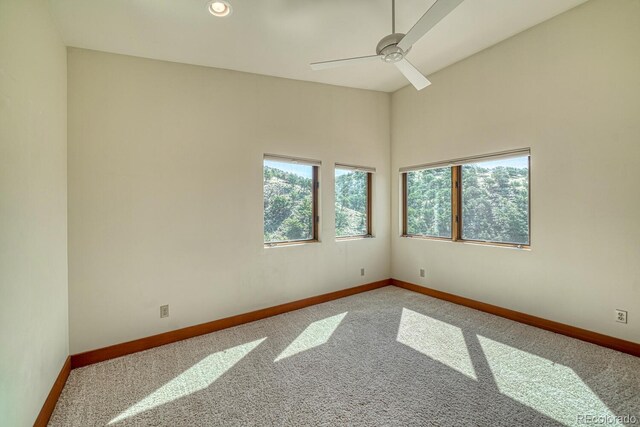 10405 W Cherokee Dr, Salida, CO 81201 - spare room featuring carpet floors, a ceiling fan, and recessed lighting