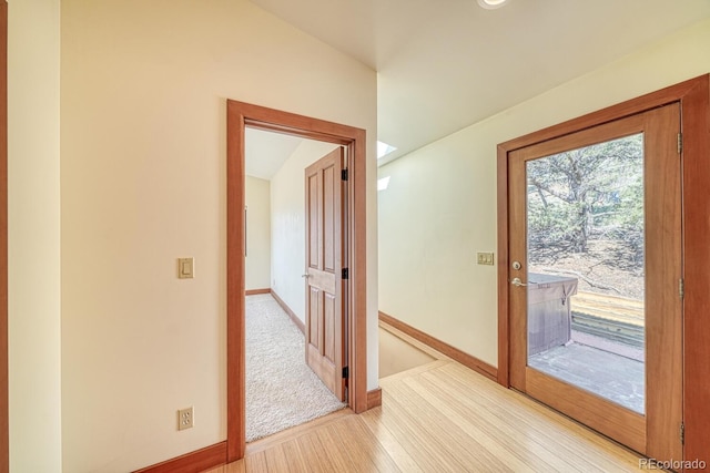 10405 W Cherokee Dr, Salida, CO 81201 - corridor with baseboards and light wood-style flooring
