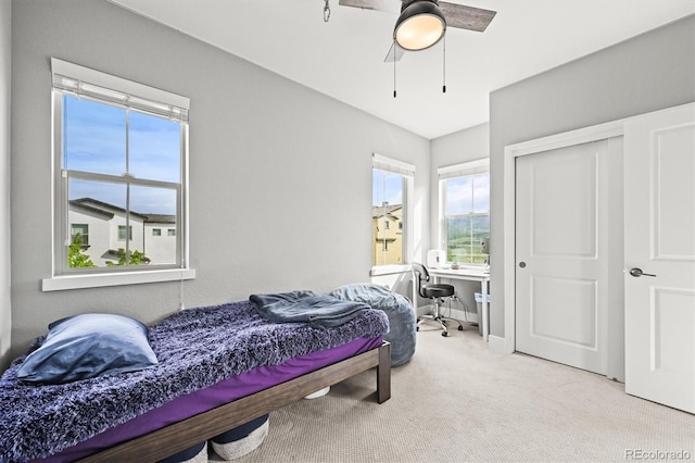 15547 W Vassar Ave, Lakewood, CO 80228 - bedroom with carpet floors, a desk, a ceiling fan, and a closet