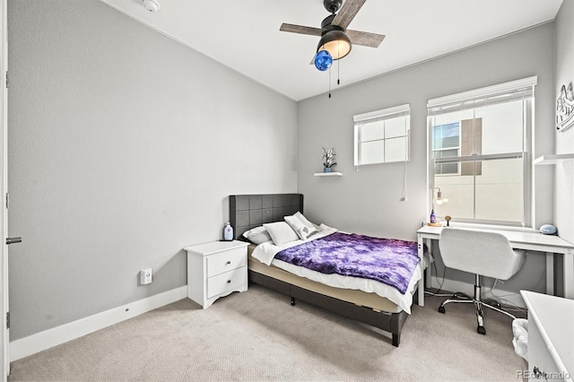 15547 W Vassar Ave, Lakewood, CO 80228 - bedroom featuring light colored carpet and ceiling fan