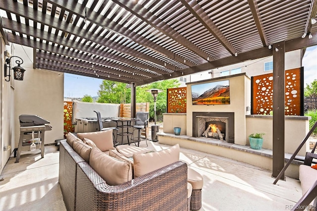 15547 W Vassar Ave, Lakewood, CO 80228 - view of patio / terrace with an outdoor living space with a fireplace and a grill