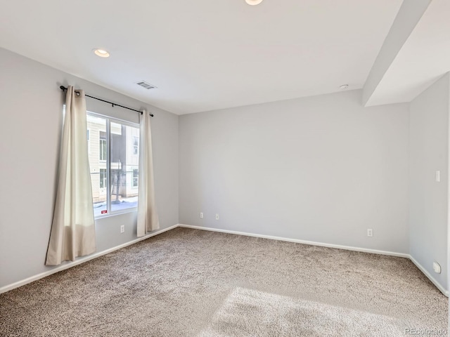 empty room featuring carpet floors