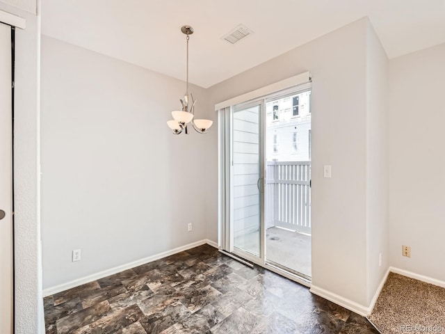 interior space with a chandelier