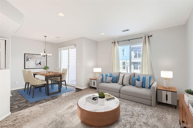 5888 Biscay St Unit D, Denver, CO 80249 - living room with a chandelier, baseboards, and recessed lighting
