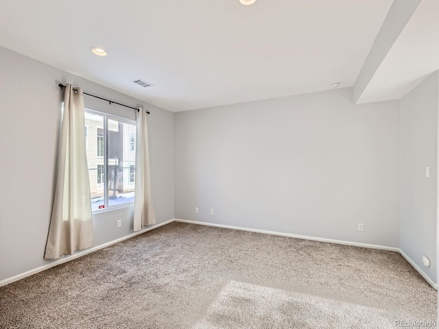 5888 Biscay St Unit D, Denver, CO 80249 - carpeted spare room with baseboards and recessed lighting
